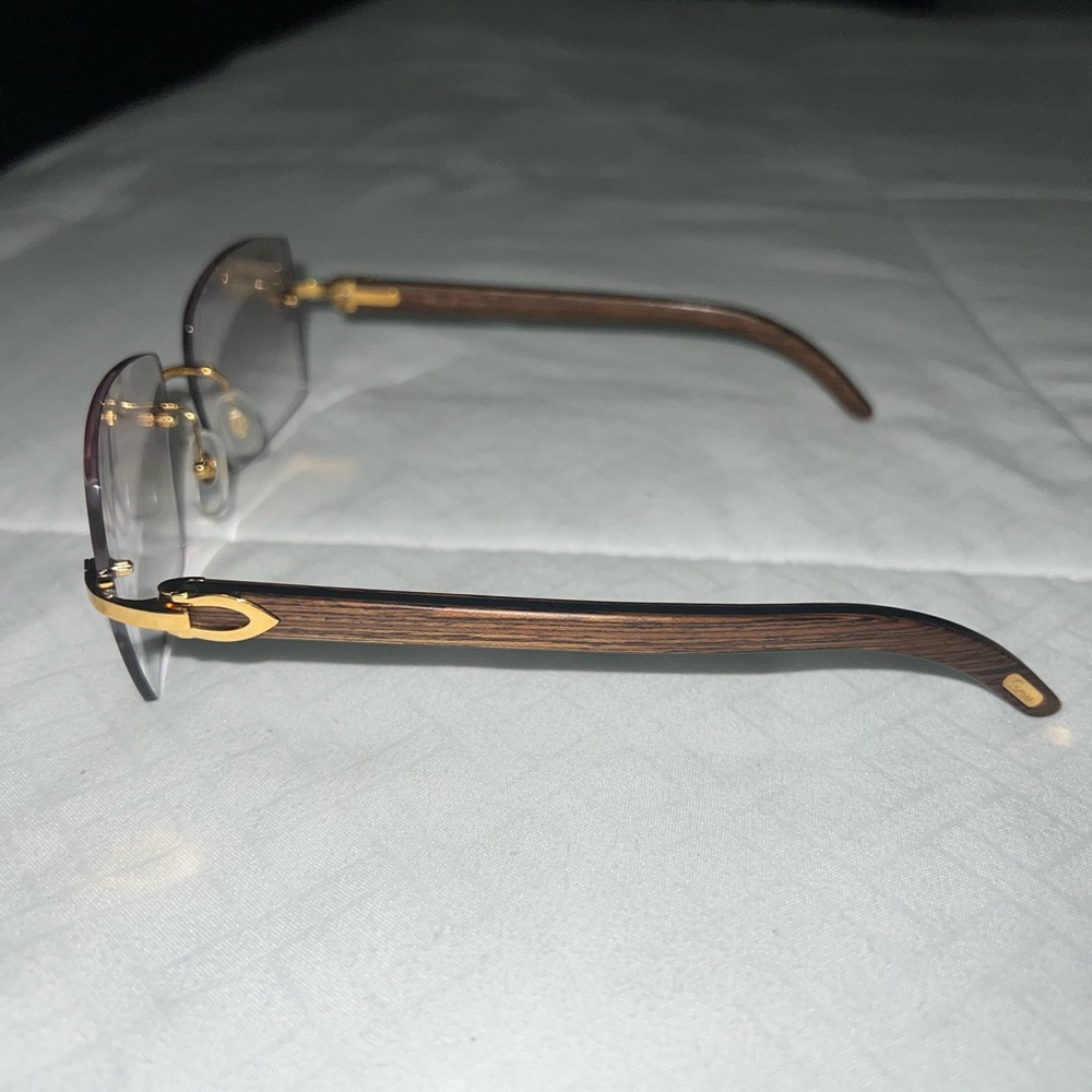 Cartier - CT0052O rimless wood glasses